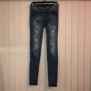 Blue Wash Distressed Skinny Jeans Tone Hem